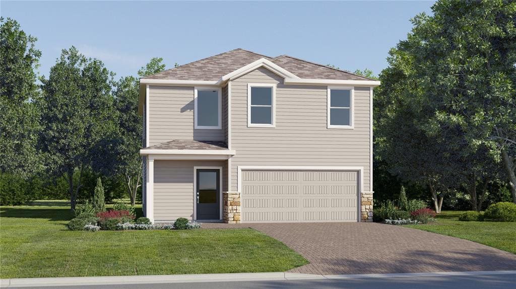 Front exterior of a new home in Wellness Ridge, Clermont, FL, highlighting curb appeal (Image 1). Front exterior of a new home in Wellness Ridge, Clermont, FL, highlighting curb appeal (Image 1).