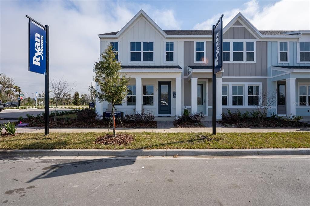 Front exterior of a new home in Rivington, Debary, FL, highlighting curb appeal (Image 1). Front exterior of a new home in Rivington, Debary, FL, highlighting curb appeal (Image 1).