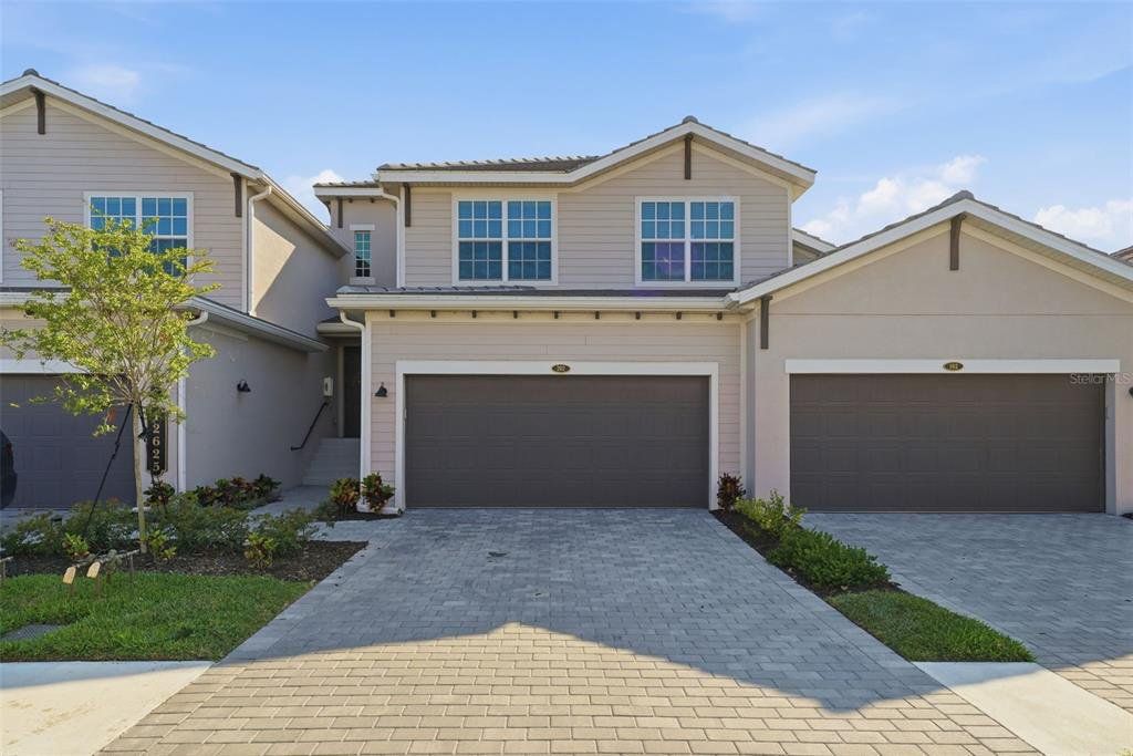 Front exterior of a new home in , Venice, FL, highlighting curb appeal (Image 1). Front exterior of a new home in , Venice, FL, highlighting curb appeal (Image 1).