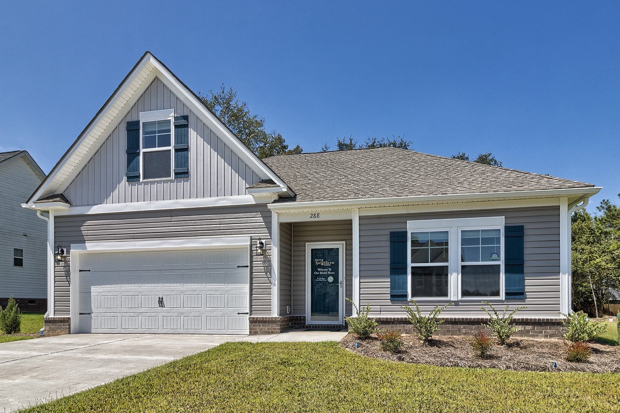Front exterior of a new home in Jackson Preserve, Sumter, SC, highlighting curb appeal (Image 1).