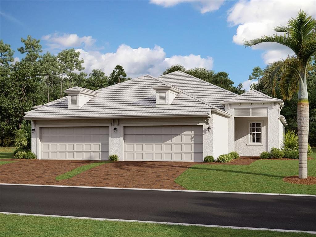 Front exterior of a new home in Sweetwater at Lakewood Ranch, Lakewood Ranch, FL, highlighting curb appeal (Image 1). Front exterior of a new home in Sweetwater at Lakewood Ranch, Lakewood Ranch, FL, highlighting curb appeal (Image 1).