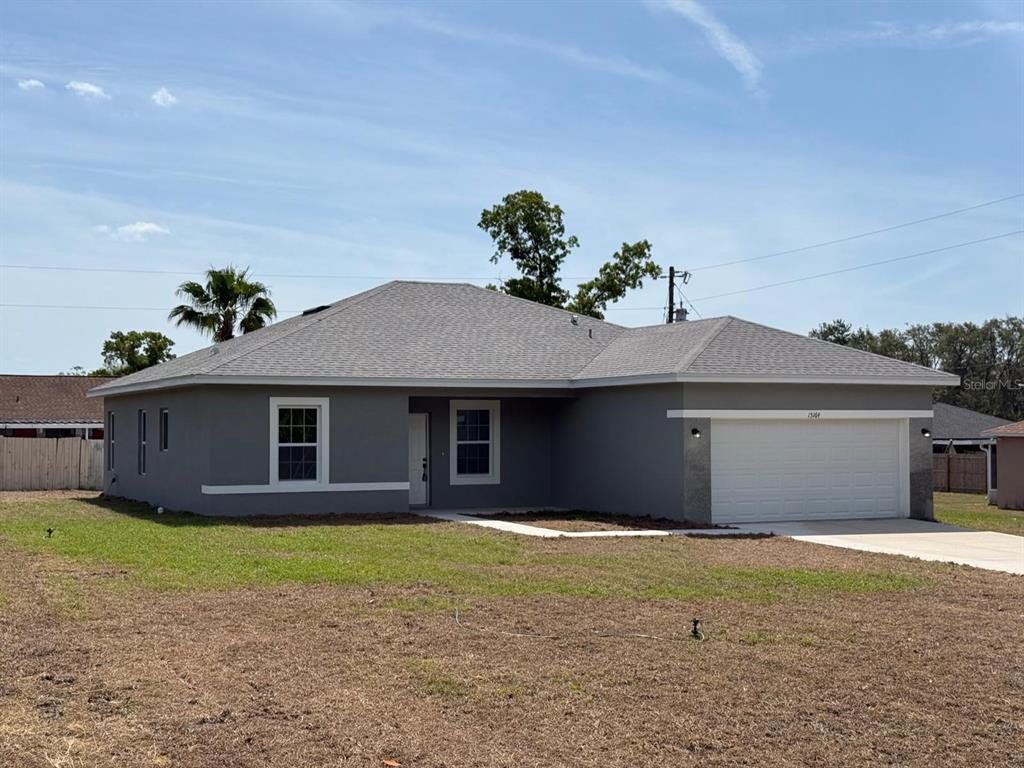 Front exterior of a new home in , Ocala, FL, highlighting curb appeal (Image 1). Front exterior of a new home in , Ocala, FL, highlighting curb appeal (Image 1).