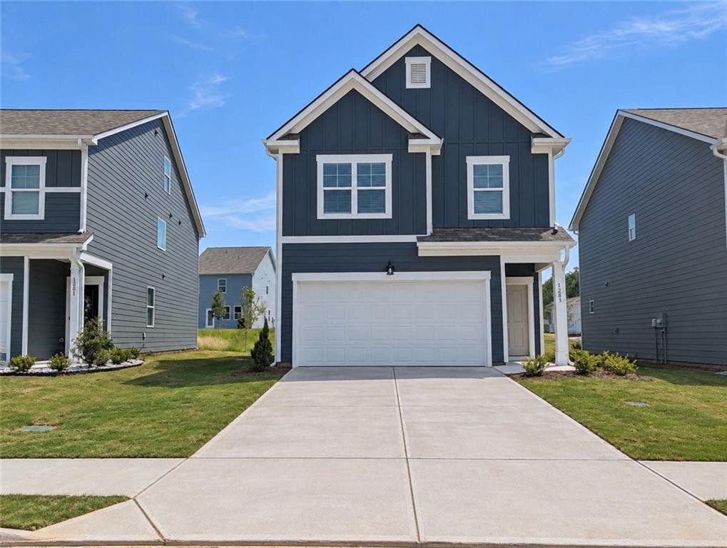 Front exterior of a new home in Walden Park – The Retreat, Jonesboro, GA, highlighting curb appeal (Image 1). Front exterior of a new home in Walden Park – The Retreat, Jonesboro, GA, highlighting curb appeal (Image 1).