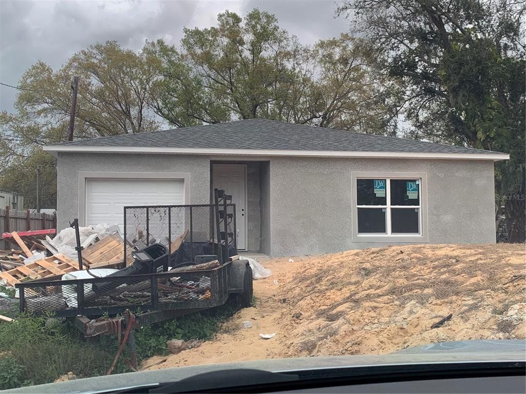 Front exterior of a new home in , Lakeland, FL, highlighting curb appeal (Image 1). Front exterior of a new home in , Lakeland, FL, highlighting curb appeal (Image 1).
