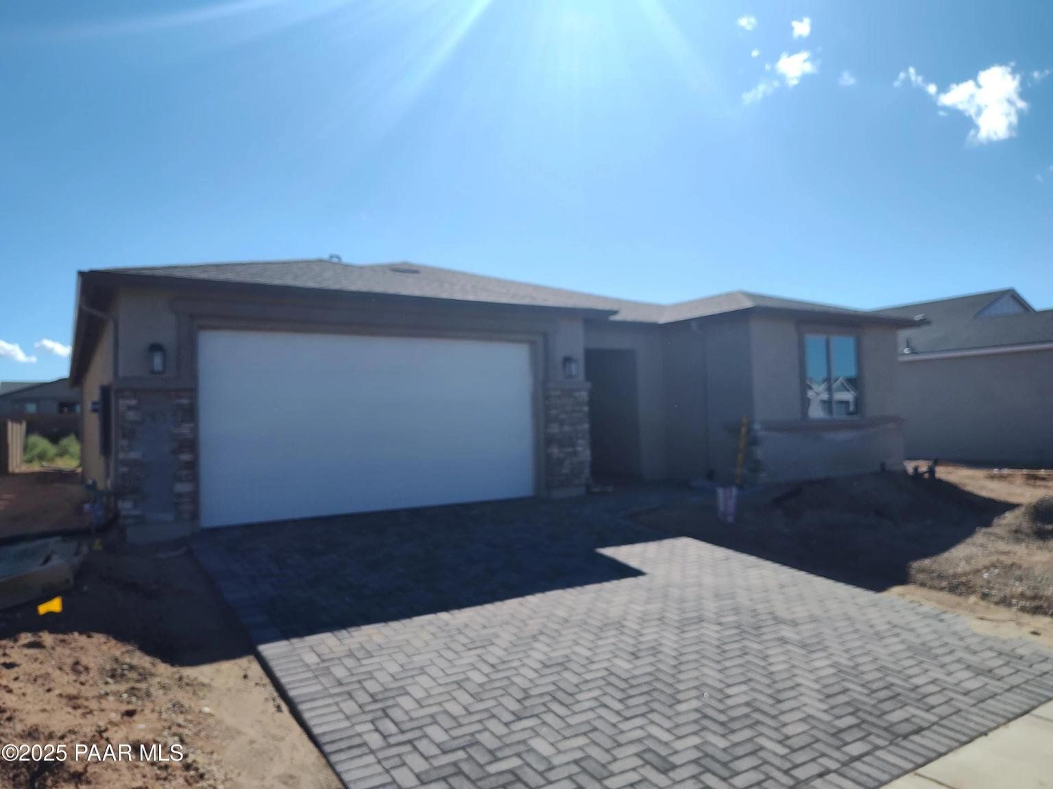 Exterior details and patio area of a home in North Ridge at Pronghorn Ranch, Prescott Valley (Image 1).