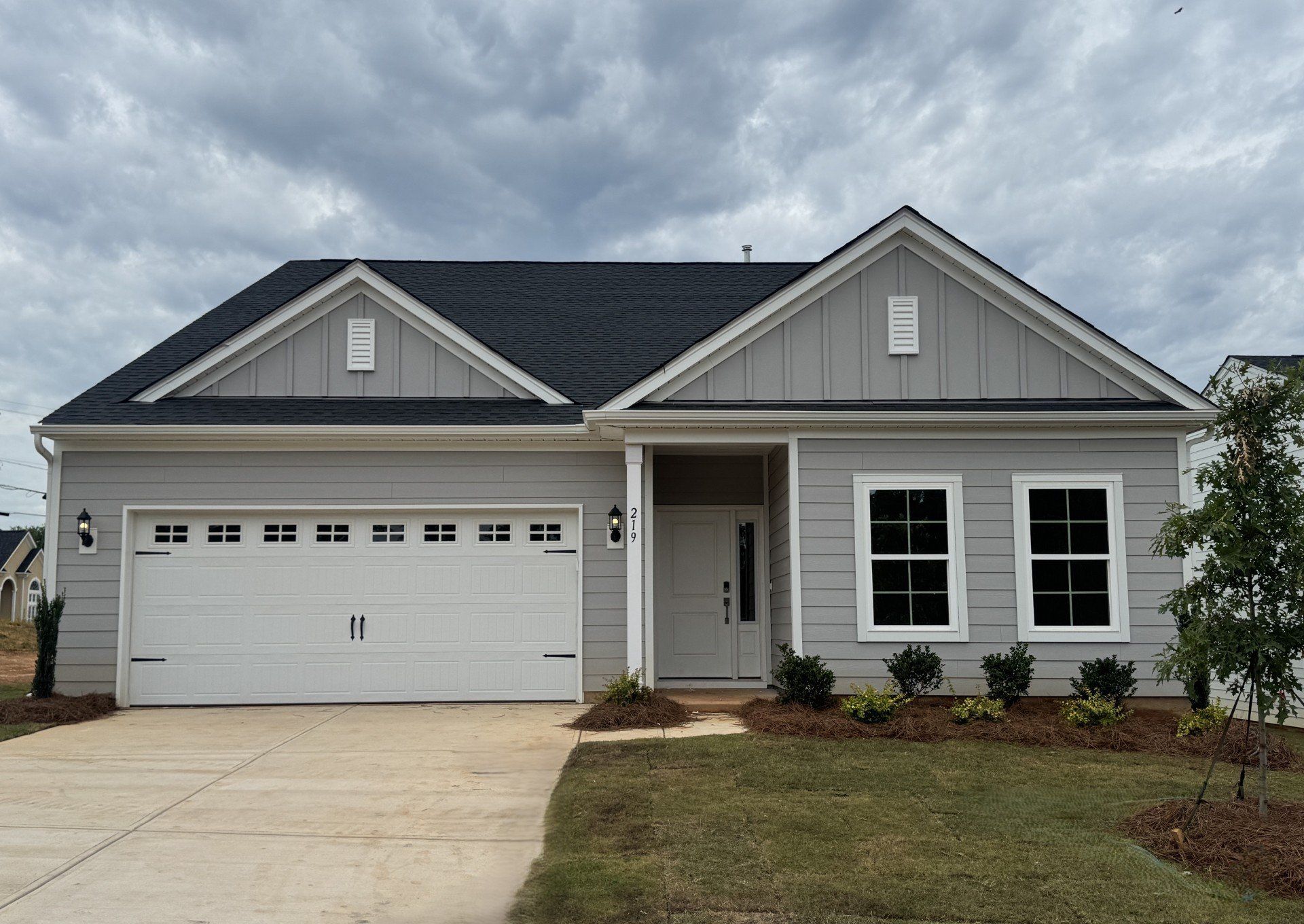 Front exterior of a new home in Willowbrook, Shelby, NC, highlighting curb appeal (Image 1). Front exterior of a new home in Willowbrook, Shelby, NC, highlighting curb appeal (Image 1).