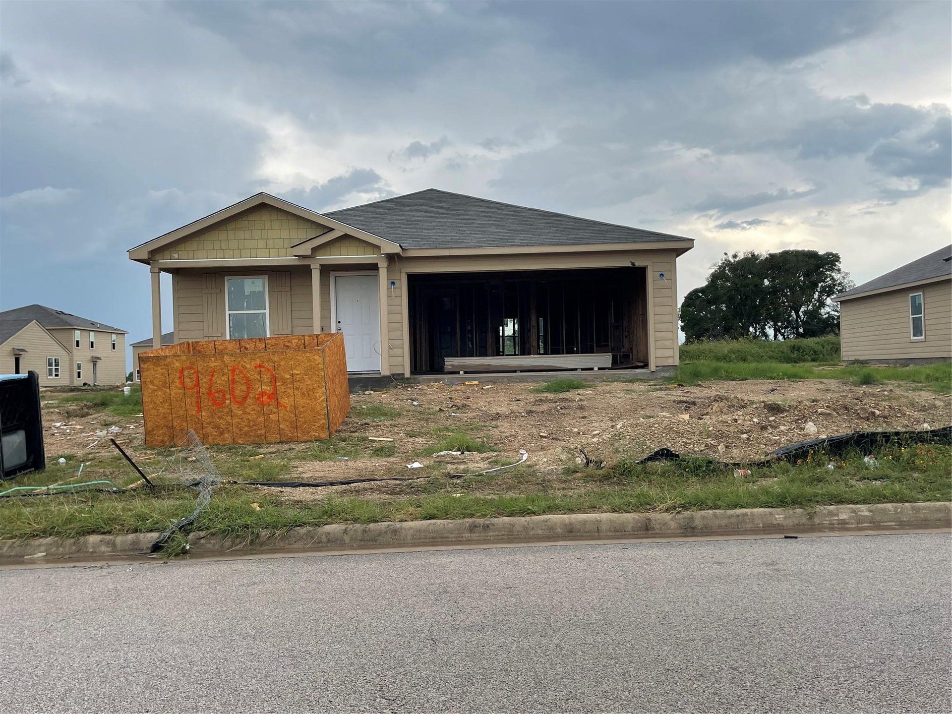 View of front facade with an attached garage