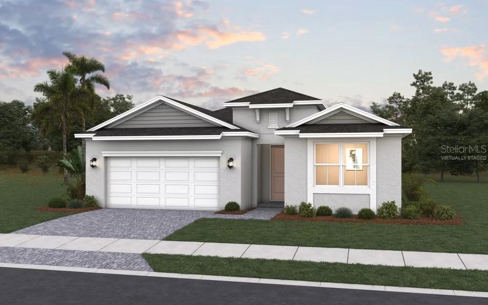 Front exterior of a new home in Brystol North at Wylder, Port St. Lucie, FL, highlighting curb appeal (Image 1).
