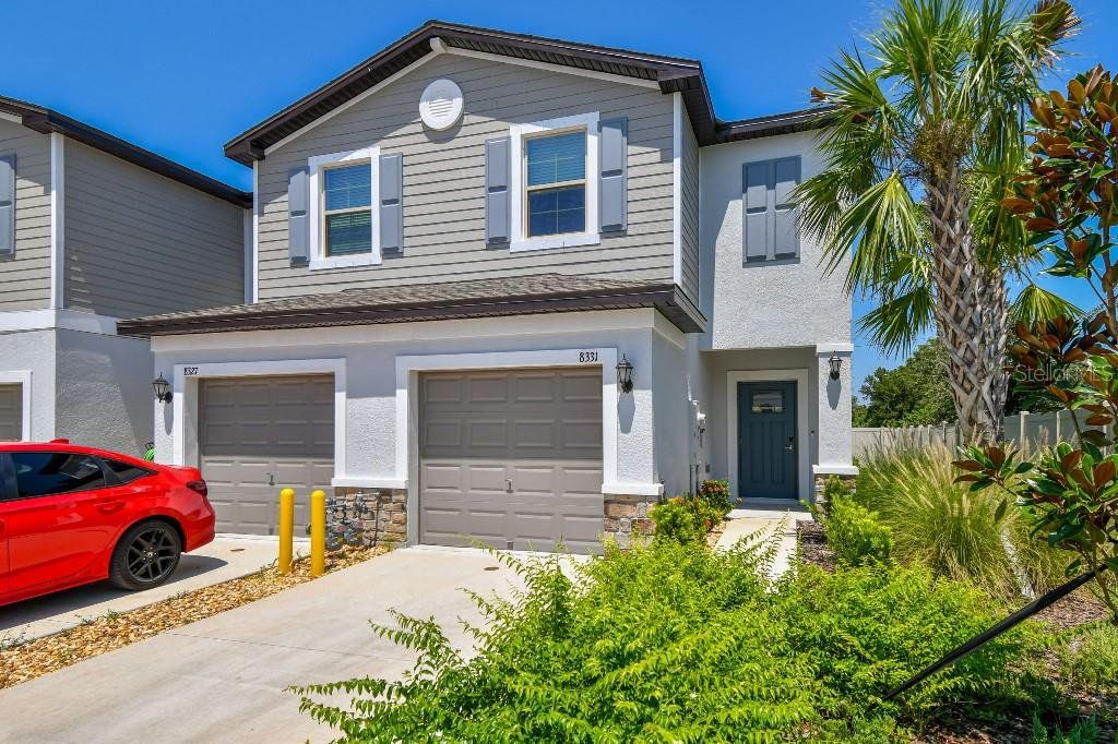 Front exterior of a new home in , New Port Richey, FL, highlighting curb appeal (Image 1). Front exterior of a new home in , New Port Richey, FL, highlighting curb appeal (Image 1).