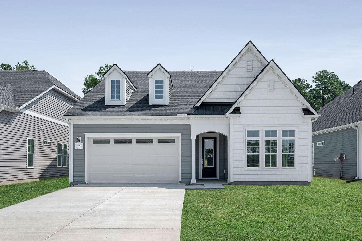 Front exterior of a new home in , Summerville, SC, highlighting curb appeal (Image 1). Front exterior of a new home in , Summerville, SC, highlighting curb appeal (Image 1).