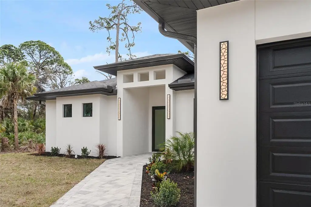 Exterior details and patio area of a home in , North Port (Image 1). Exterior details and patio area of a home in , North Port (Image 1).