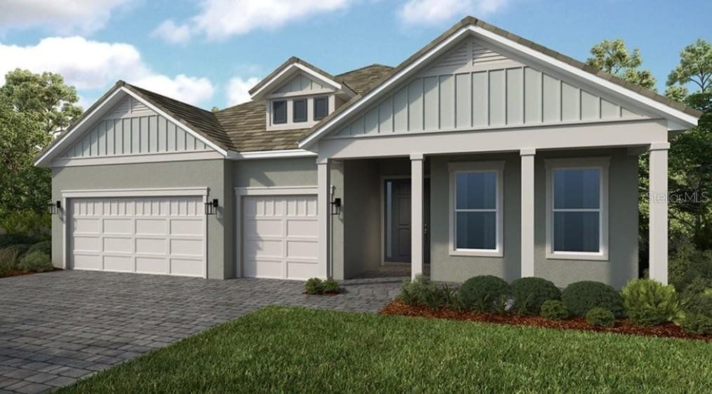 Front exterior of a new home in Coasterra Community Group Page, Palmetto, FL, highlighting curb appeal (Image 1). Front exterior of a new home in Coasterra Community Group Page, Palmetto, FL, highlighting curb appeal (Image 1).