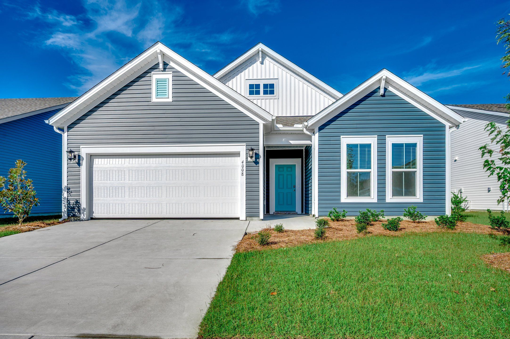 Front exterior of a new home in Somerset, Myrtle Beach, SC, highlighting curb appeal (Image 1).