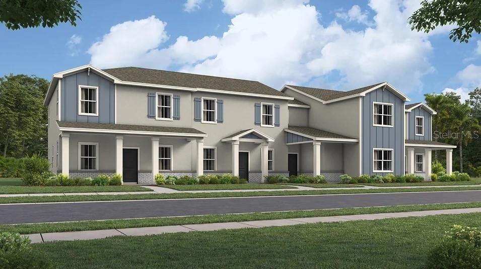 Front exterior of a new home in Bridgewalk, St. Cloud, FL, highlighting curb appeal (Image 1). Front exterior of a new home in Bridgewalk, St. Cloud, FL, highlighting curb appeal (Image 1).