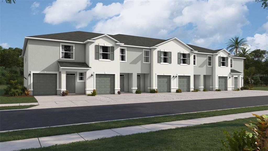 Front exterior of a new home in Village Oaks, Largo, FL, highlighting curb appeal (Image 1). Front exterior of a new home in Village Oaks, Largo, FL, highlighting curb appeal (Image 1).