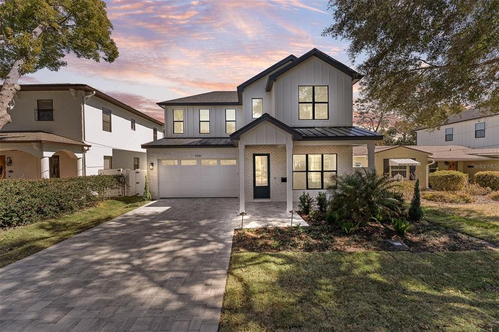 Front exterior of a new home in , Orlando, FL, highlighting curb appeal (Image 1). Front exterior of a new home in , Orlando, FL, highlighting curb appeal (Image 1).