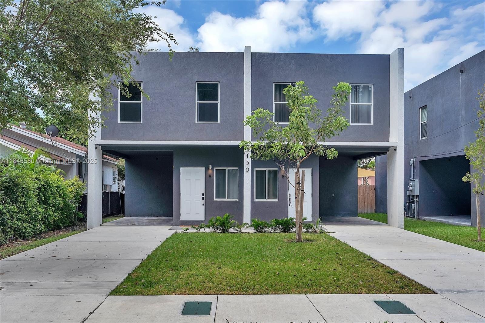 Front exterior of a new home in , Miami, FL, highlighting curb appeal (Image 1). Front exterior of a new home in , Miami, FL, highlighting curb appeal (Image 1).