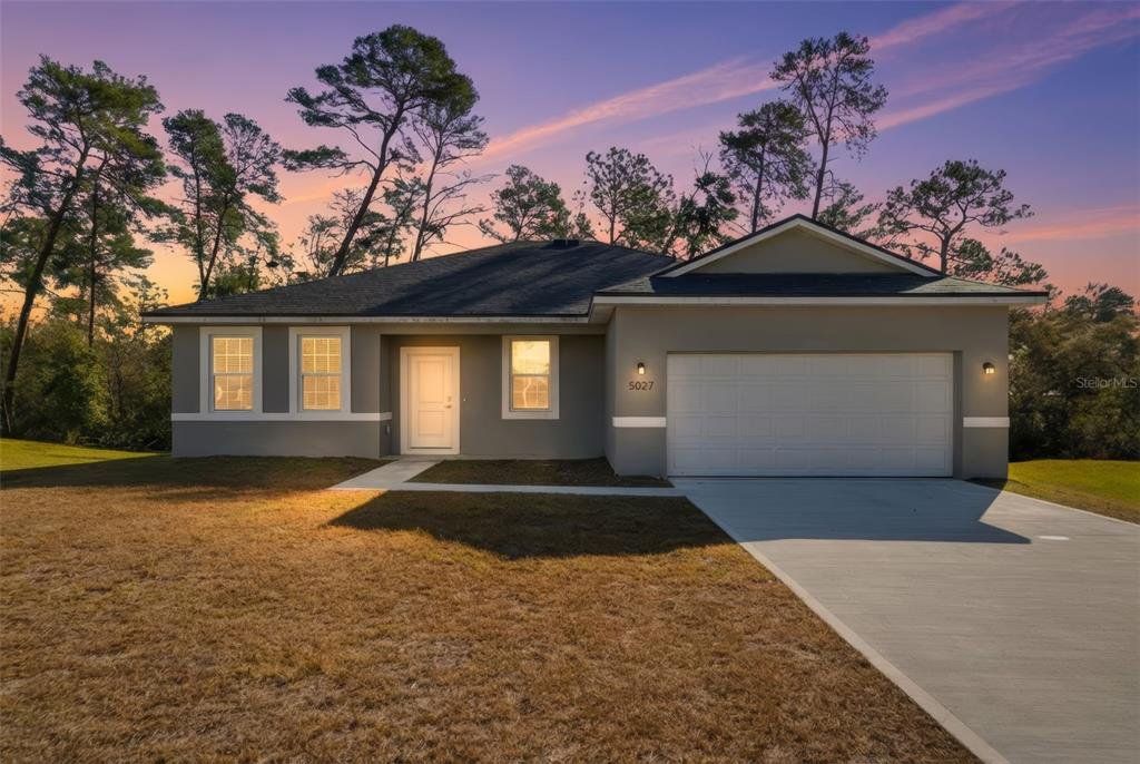 Front exterior of a new home in , Ocala, FL, highlighting curb appeal (Image 1). Front exterior of a new home in , Ocala, FL, highlighting curb appeal (Image 1).