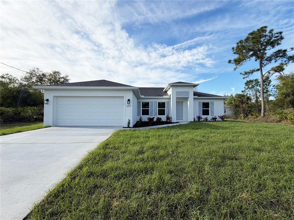Front exterior of a new home in , North Port, FL, highlighting curb appeal (Image 1). Front exterior of a new home in , North Port, FL, highlighting curb appeal (Image 1).