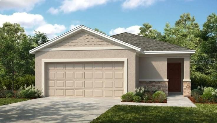 Front exterior of a new home in Waterstone, Groveland, FL, highlighting curb appeal (Image 1). Front exterior of a new home in Waterstone, Groveland, FL, highlighting curb appeal (Image 1).