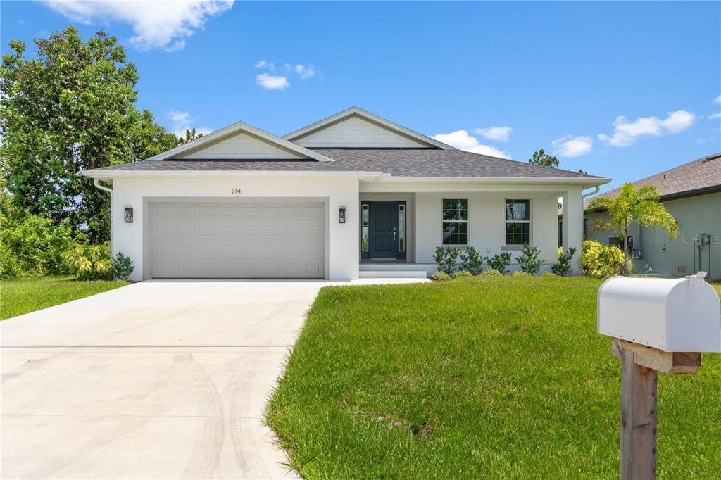 Front exterior of a new home in , Rotonda West, FL, highlighting curb appeal (Image 1). Front exterior of a new home in , Rotonda West, FL, highlighting curb appeal (Image 1).