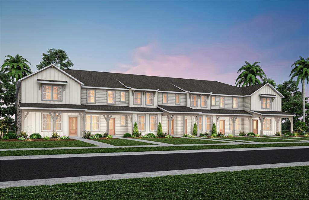 Front exterior of a new home in EverBe, Orlando, FL, highlighting curb appeal (Image 1). Front exterior of a new home in EverBe, Orlando, FL, highlighting curb appeal (Image 1).