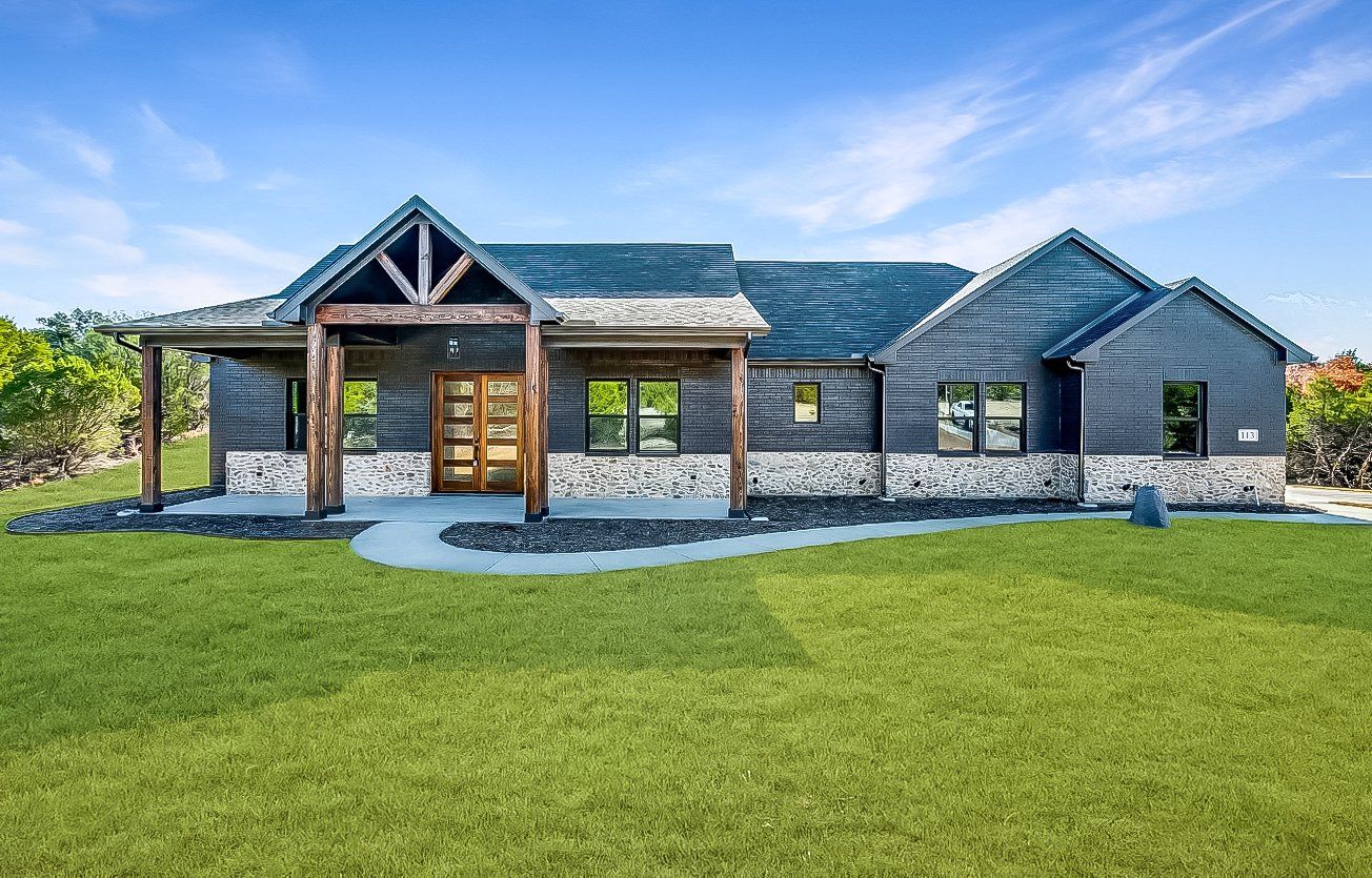 Representative exterior photo of a completed home built from the Stratton by Trinity Classic Homes in Zion Trails, Poolville, TX (Image 1). Representative exterior photo of a completed home built from the Stratton by Trinity Classic Homes in Zion Trails, Poolville, TX (Image 1).
