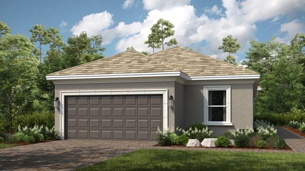 Front exterior of a new home in Esplanade at Wiregrass Ranch, Wesley Chapel, FL, highlighting curb appeal (Image 1). Front exterior of a new home in Esplanade at Wiregrass Ranch, Wesley Chapel, FL, highlighting curb appeal (Image 1).