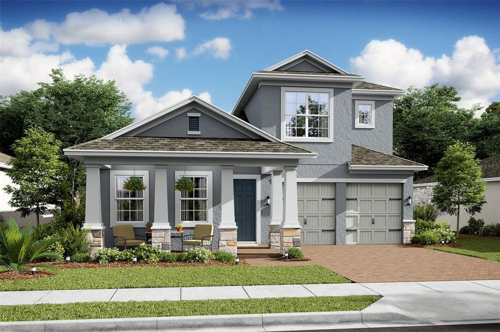 Front exterior of a new home in Osprey Ranch, Winter Garden, FL, highlighting curb appeal (Image 1). Front exterior of a new home in Osprey Ranch, Winter Garden, FL, highlighting curb appeal (Image 1).