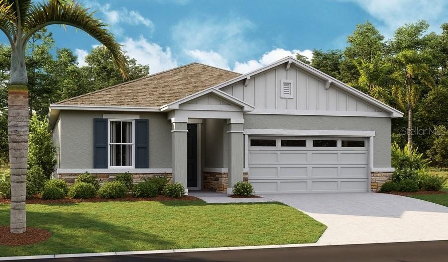 Front exterior of a new home in Seasons at Lakeside Forest, Tavares, FL, highlighting curb appeal (Image 1).