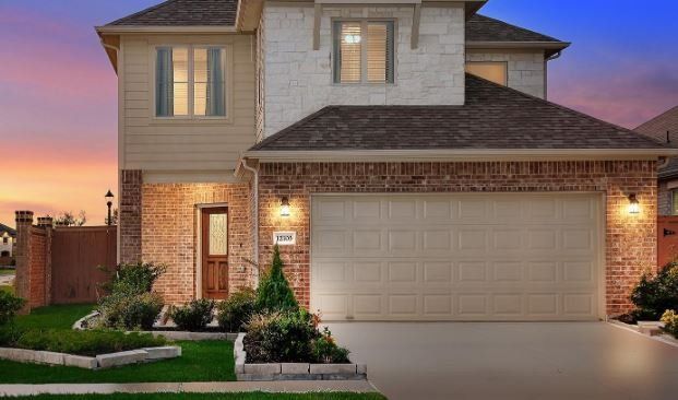 Front exterior of a new home in Balmoral East, Humble, TX, highlighting curb appeal (Image 1). Front exterior of a new home in Balmoral East, Humble, TX, highlighting curb appeal (Image 1).