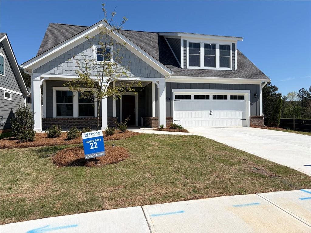 Front exterior of a new home in The Courtyards at Bailey Farms, Dacula, GA, highlighting curb appeal (Image 1). Front exterior of a new home in The Courtyards at Bailey Farms, Dacula, GA, highlighting curb appeal (Image 1).