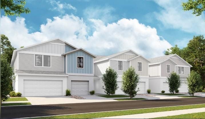 Front exterior of a new home in Grove at Crosswinds, Haines City, FL, highlighting curb appeal (Image 1). Front exterior of a new home in Grove at Crosswinds, Haines City, FL, highlighting curb appeal (Image 1).