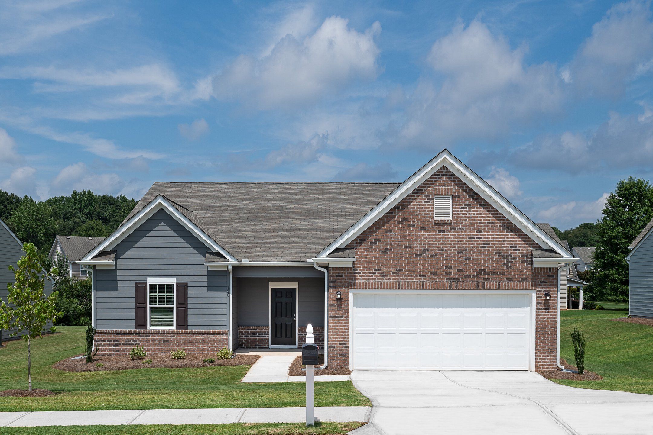 Front exterior of a new home in Silverton, Dacula, GA, highlighting curb appeal (Image 1).