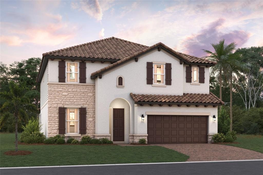 Front exterior of a new home in Sweetwater at Lakewood Ranch, Lakewood Ranch, FL, highlighting curb appeal (Image 1). Front exterior of a new home in Sweetwater at Lakewood Ranch, Lakewood Ranch, FL, highlighting curb appeal (Image 1).