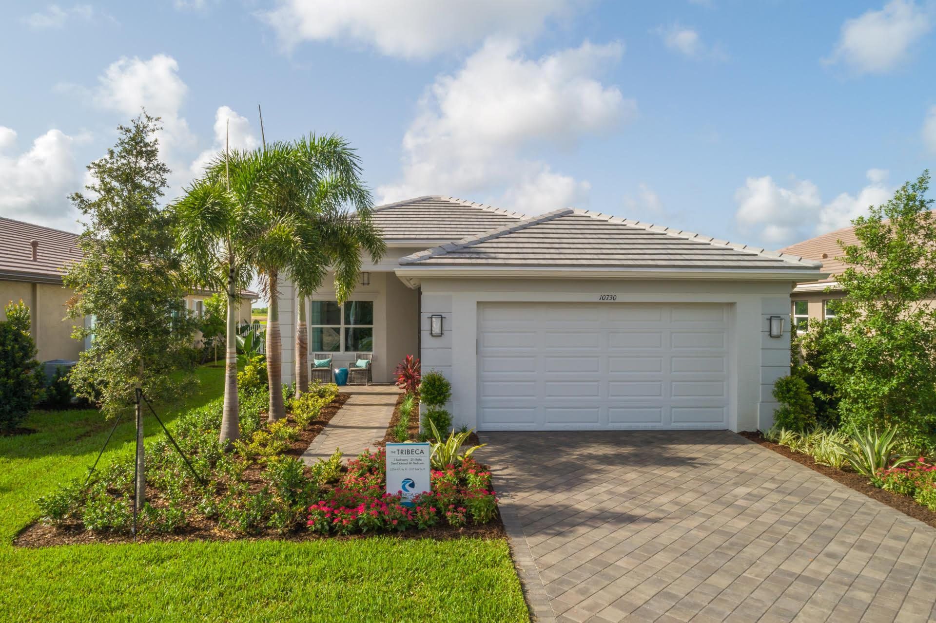Front exterior of a new home in , Port St. Lucie, FL, highlighting curb appeal (Image 1). Front exterior of a new home in , Port St. Lucie, FL, highlighting curb appeal (Image 1).