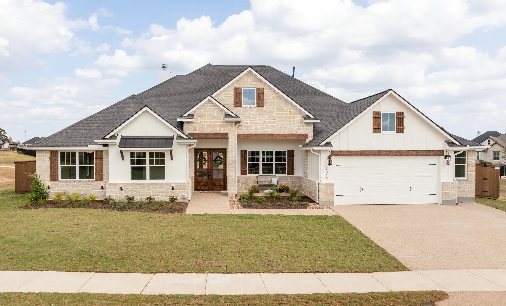 Front exterior of a home in the Pebble Creek community, located in College Station, TX (Image 1).