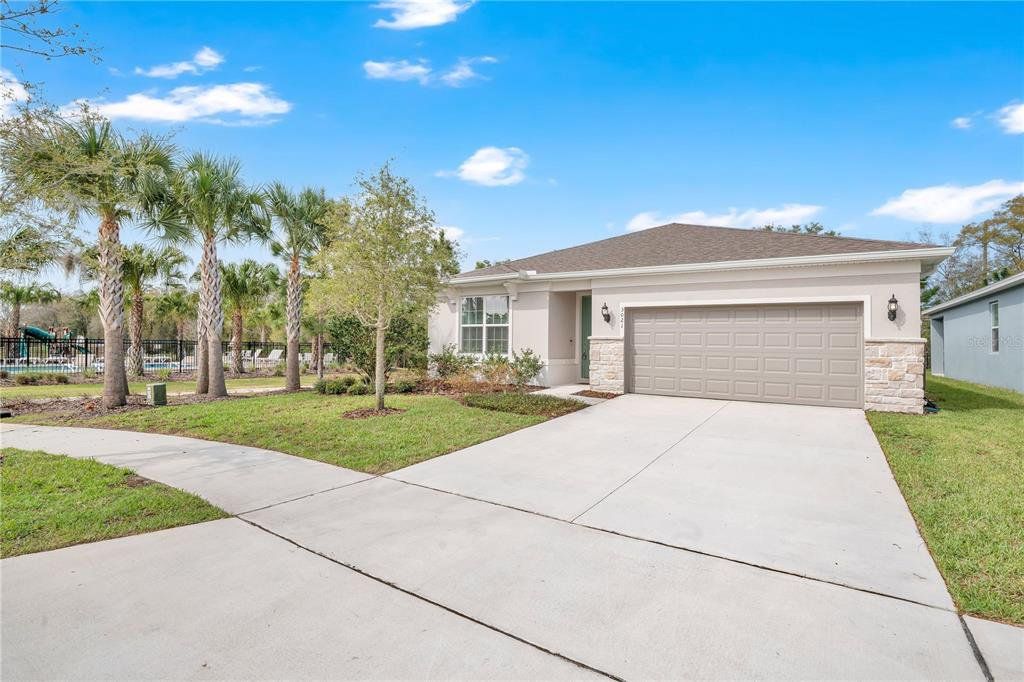 Front exterior of a new home in , Deland, FL, highlighting curb appeal (Image 1). Front exterior of a new home in , Deland, FL, highlighting curb appeal (Image 1).