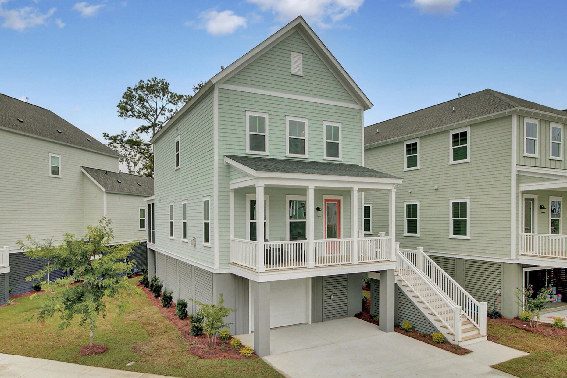 Front exterior of a new home in , Johns Island, SC, highlighting curb appeal (Image 1). Front exterior of a new home in , Johns Island, SC, highlighting curb appeal (Image 1).