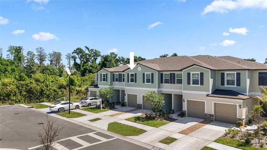 Front exterior of a new home in , Ruskin, FL, highlighting curb appeal (Image 1). Front exterior of a new home in , Ruskin, FL, highlighting curb appeal (Image 1).