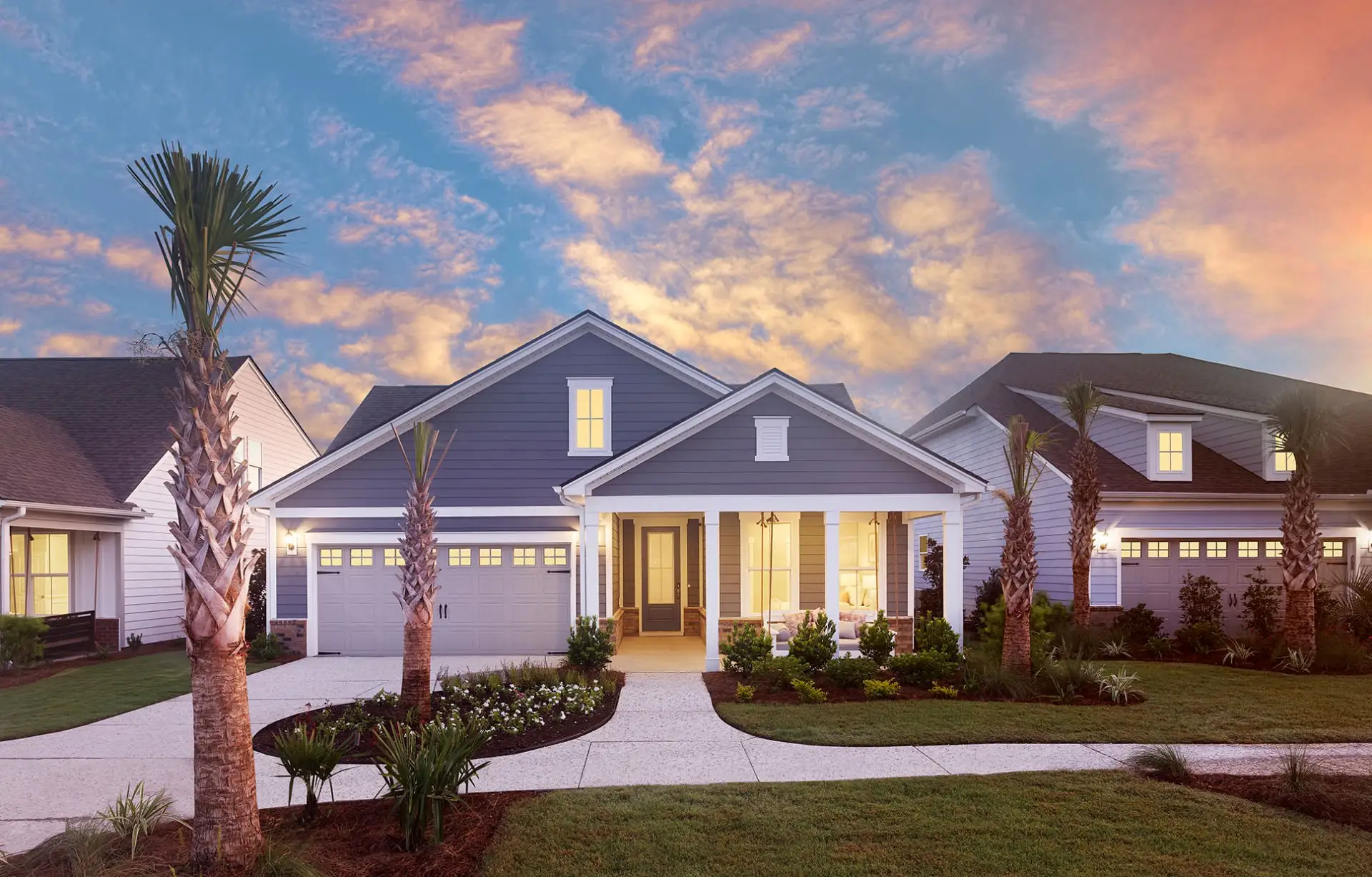 Front exterior of a new home in Sun City Hilton Head, Bluffton, SC, highlighting curb appeal (Image 1). Front exterior of a new home in Sun City Hilton Head, Bluffton, SC, highlighting curb appeal (Image 1).