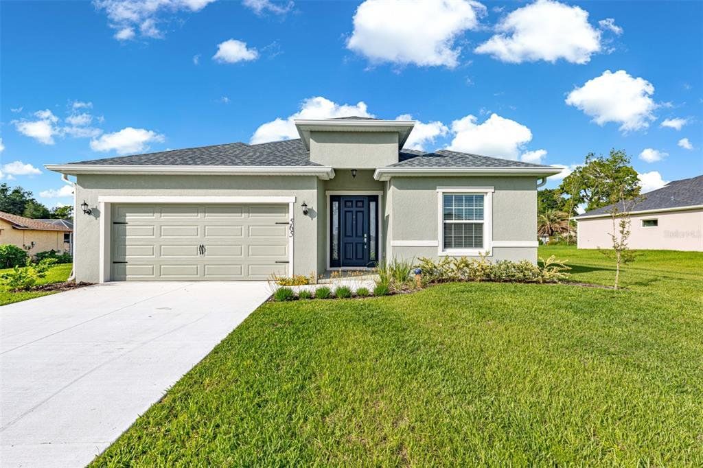 Front exterior of a new home in , Ocala, FL, highlighting curb appeal (Image 1). Front exterior of a new home in , Ocala, FL, highlighting curb appeal (Image 1).