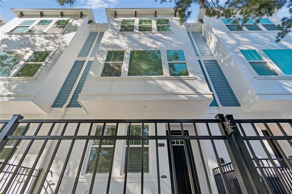 Exterior details and patio area of a home in Apex at Seminole Heights, Tampa (Image 1). Exterior details and patio area of a home in Apex at Seminole Heights, Tampa (Image 1).