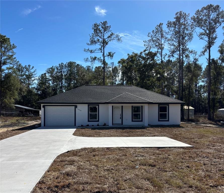 Front exterior of a new home in , Ocala, FL, highlighting curb appeal (Image 1). Front exterior of a new home in , Ocala, FL, highlighting curb appeal (Image 1).