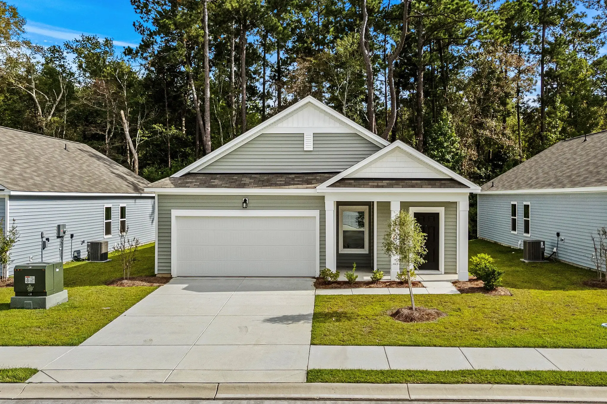 Front exterior of a new home in Andalusia, Loris, SC, highlighting curb appeal (Image 1). Front exterior of a new home in Andalusia, Loris, SC, highlighting curb appeal (Image 1).