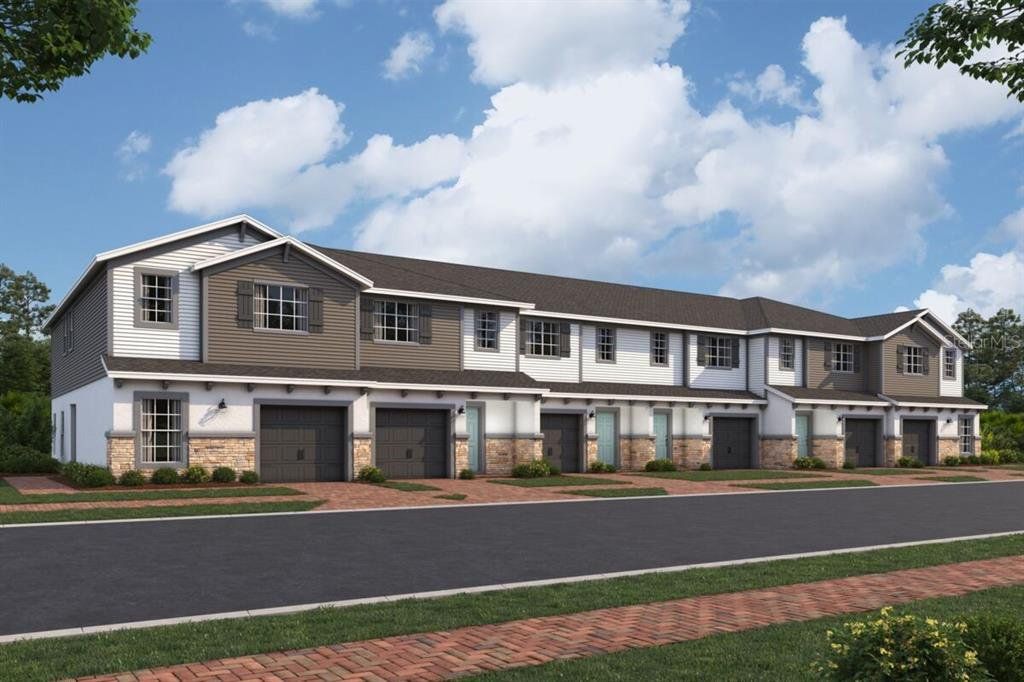 Front exterior of a new home in Tyson Ranch, Orlando, FL, highlighting curb appeal (Image 1).