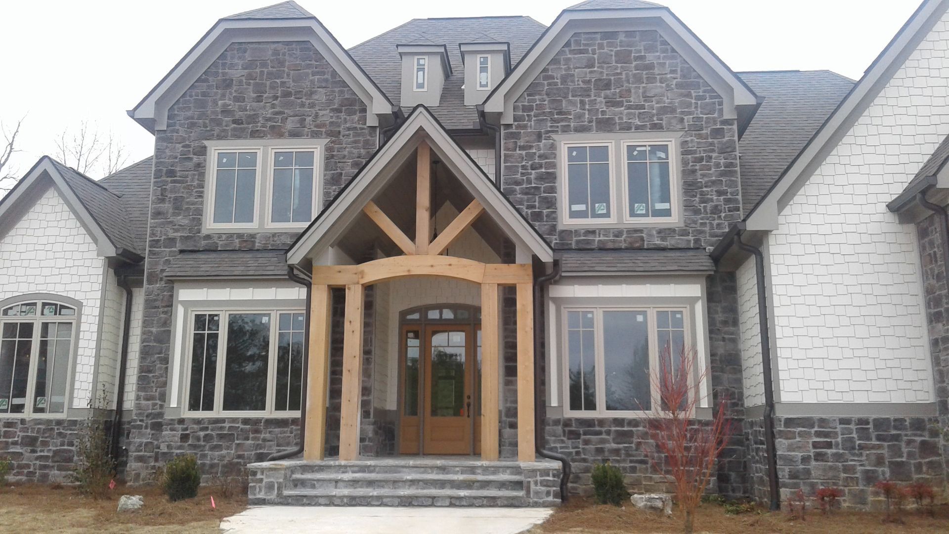 Representative exterior photo of a completed home built from the Kingsbridge by Bamford and Company in Carter Grove, Cartersville, GA (Image 1). Representative exterior photo of a completed home built from the Kingsbridge by Bamford and Company in Carter Grove, Cartersville, GA (Image 1).