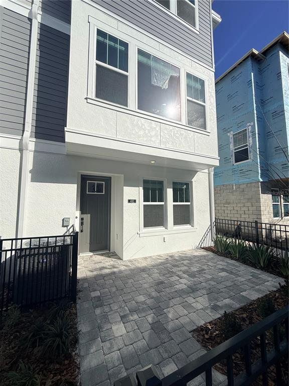 Exterior details and patio area of a home in Towns at Union, St. Petersburg (Image 1). Exterior details and patio area of a home in Towns at Union, St. Petersburg (Image 1).