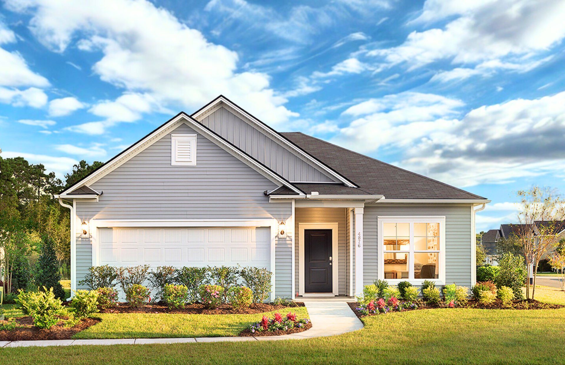Front exterior of a new home in Crescent Cove, Myrtle Beach, SC, highlighting curb appeal (Image 1). Front exterior of a new home in Crescent Cove, Myrtle Beach, SC, highlighting curb appeal (Image 1).