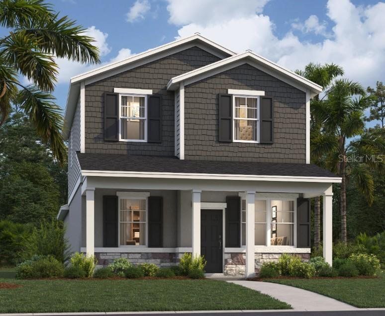 Front exterior of a new home in Spring Walk at the Junction, Debary, FL, highlighting curb appeal (Image 1). Front exterior of a new home in Spring Walk at the Junction, Debary, FL, highlighting curb appeal (Image 1).